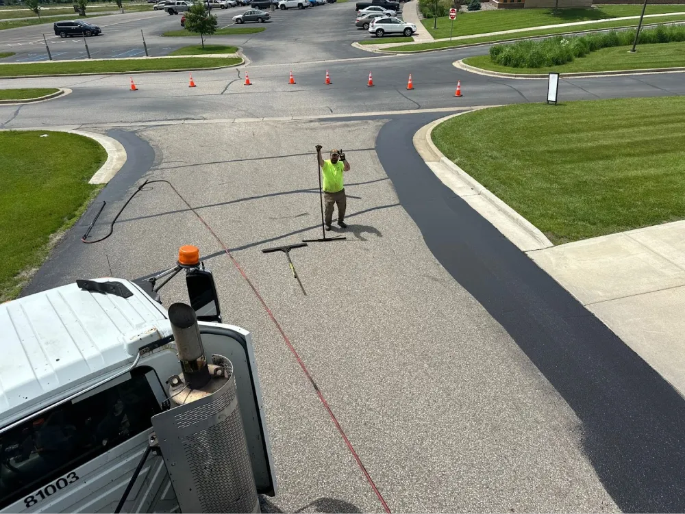 Sealcoating 101: Protecting Asphalt Before Winter
